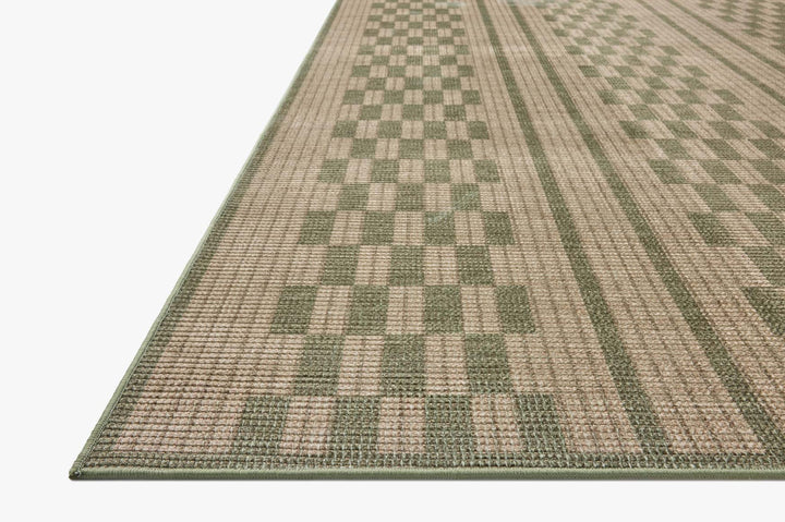Tapis Archibald naturel et vert Amber Lewis × Loloi — vue stylisée