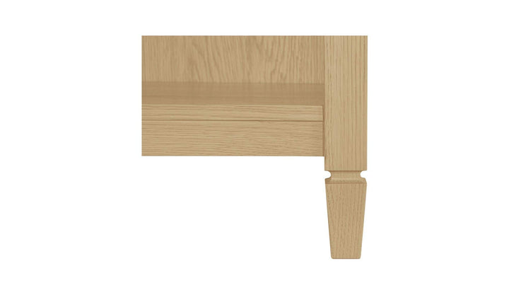 Détail du pied fuselé et du bois de la console ISABELLE