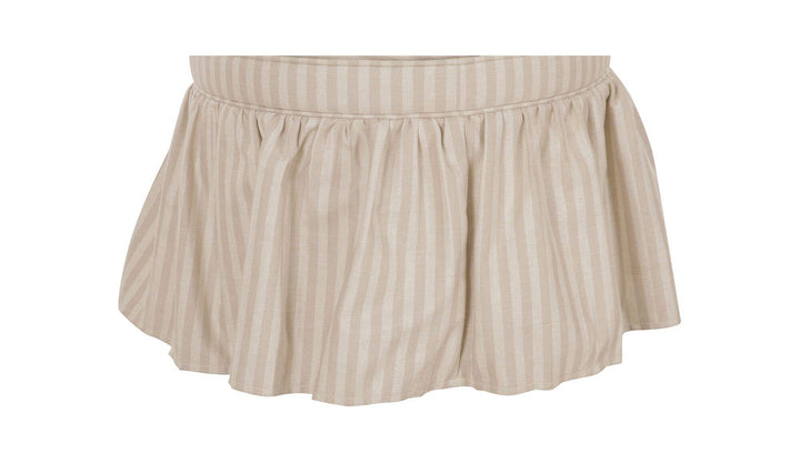Ottoman de rangement HEIDI rayures beige, détail de la jupe froncée