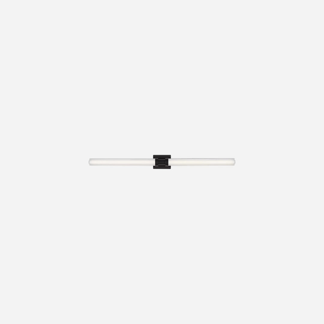 Applique murale Maison Olive Kiel au design minimaliste avec diffuseur cylindrique en verre givré et support noir