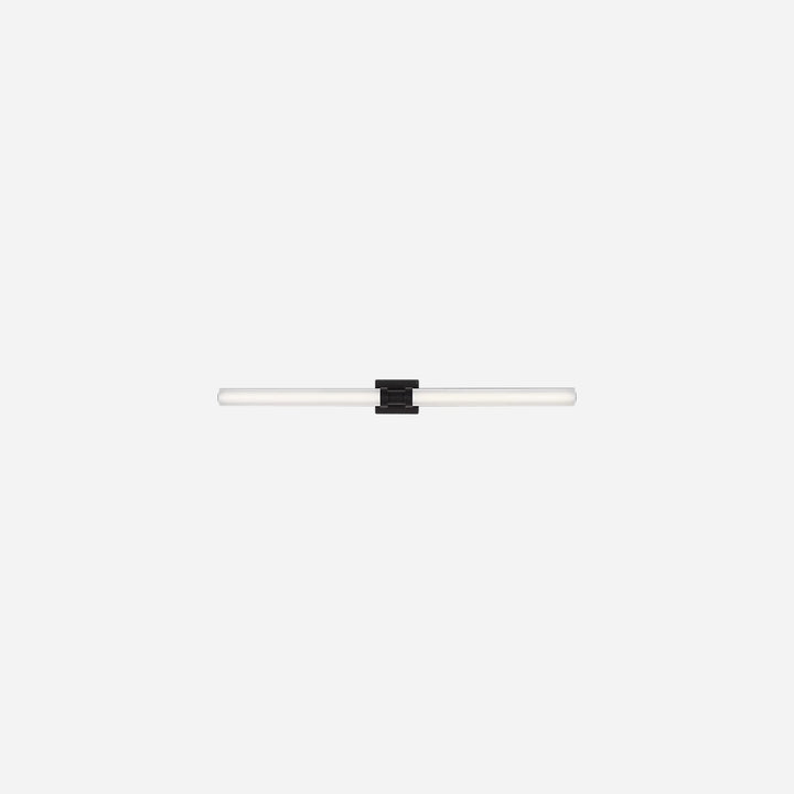 Applique murale Maison Olive Kiel au design minimaliste avec diffuseur cylindrique en verre givré et support noir
