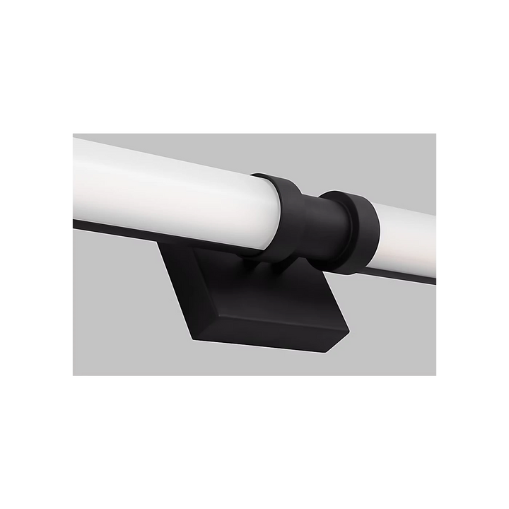 Applique murale Maison Olive Kiel avec diffuseur cylindrique en verre givré et support noir mat minimaliste