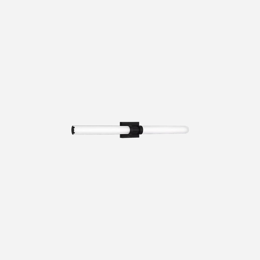 Applique murale Maison Olive Kiel au design minimaliste avec diffuseur cylindrique en verre givré et support noir