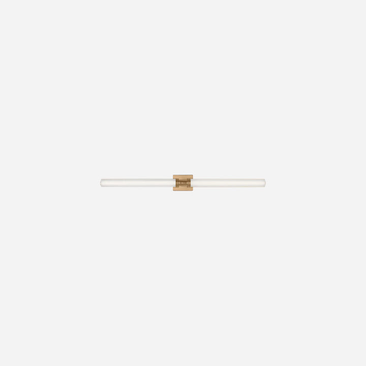 Applique murale Maison Olive Kiel au design minimaliste avec diffuseur cylindrique en verre givré et finition dorée