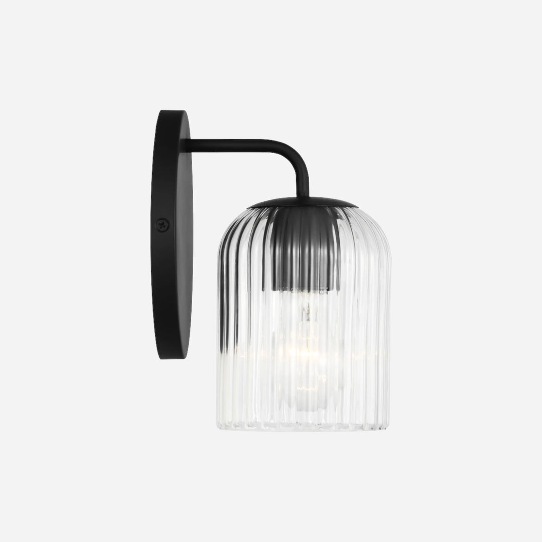 Applique murale Maison Olive EISELE en métal noir avec abat-jour en verre cannelé transparent au design minimaliste
