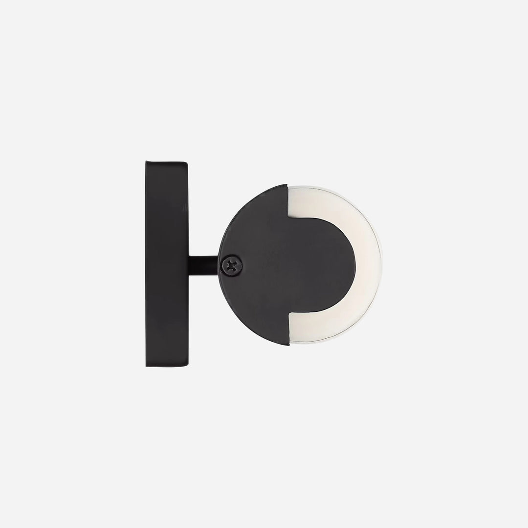 Applique murale Maison Olive Kiel au design minimaliste noir avec diffuseur cylindrique en verre givré