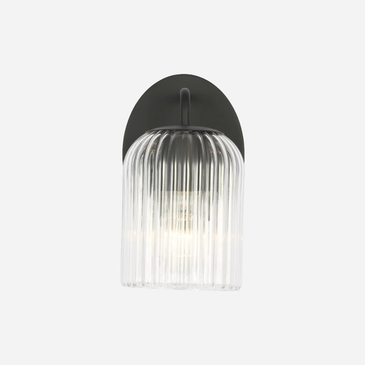 Applique murale Maison Olive EISELE avec abat-jour en verre cannelé transparent et support en métal noir mat