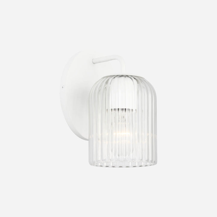 Applique murale Maison Olive EISELE avec support blanc et abat-jour en verre cannelé transparent