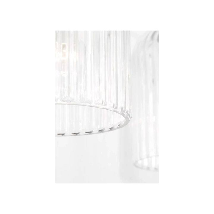 Applique murale double Maison Olive en verre strié transparent et métal brossé argenté, éclairage d'ambiance moderne.