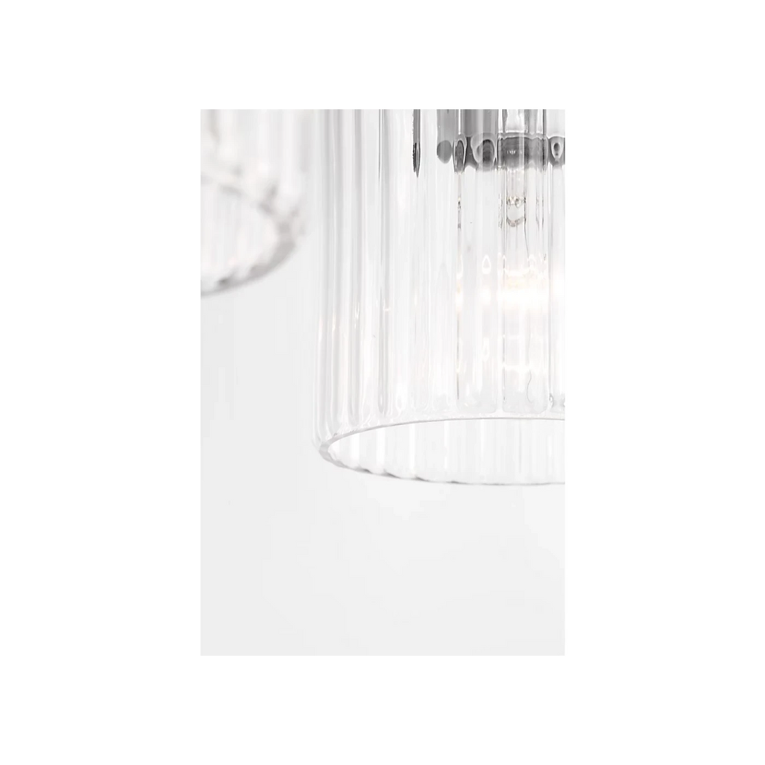 Maison Olive applique murale double en verre strié transparent et métal brossé argenté, éclairage d'ambiance moderne.