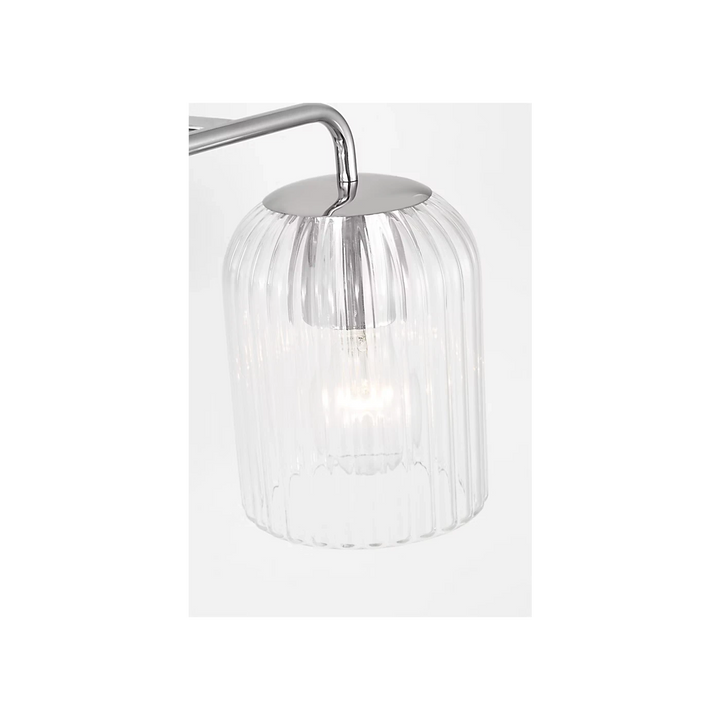 Maison Olive Applique murale double en verre strié et métal brossé argenté, éclairage d'ambiance moderne.