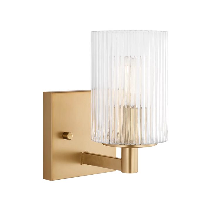 Maison Olive applique murale en verre strié transparent et métal brossé doré, design cylindrique moderne.