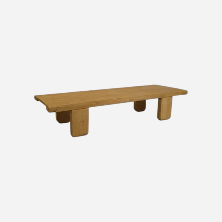 Banc bas Maison Olive en bois massif clair au design minimaliste d'inspiration japonaise pour salon zen.