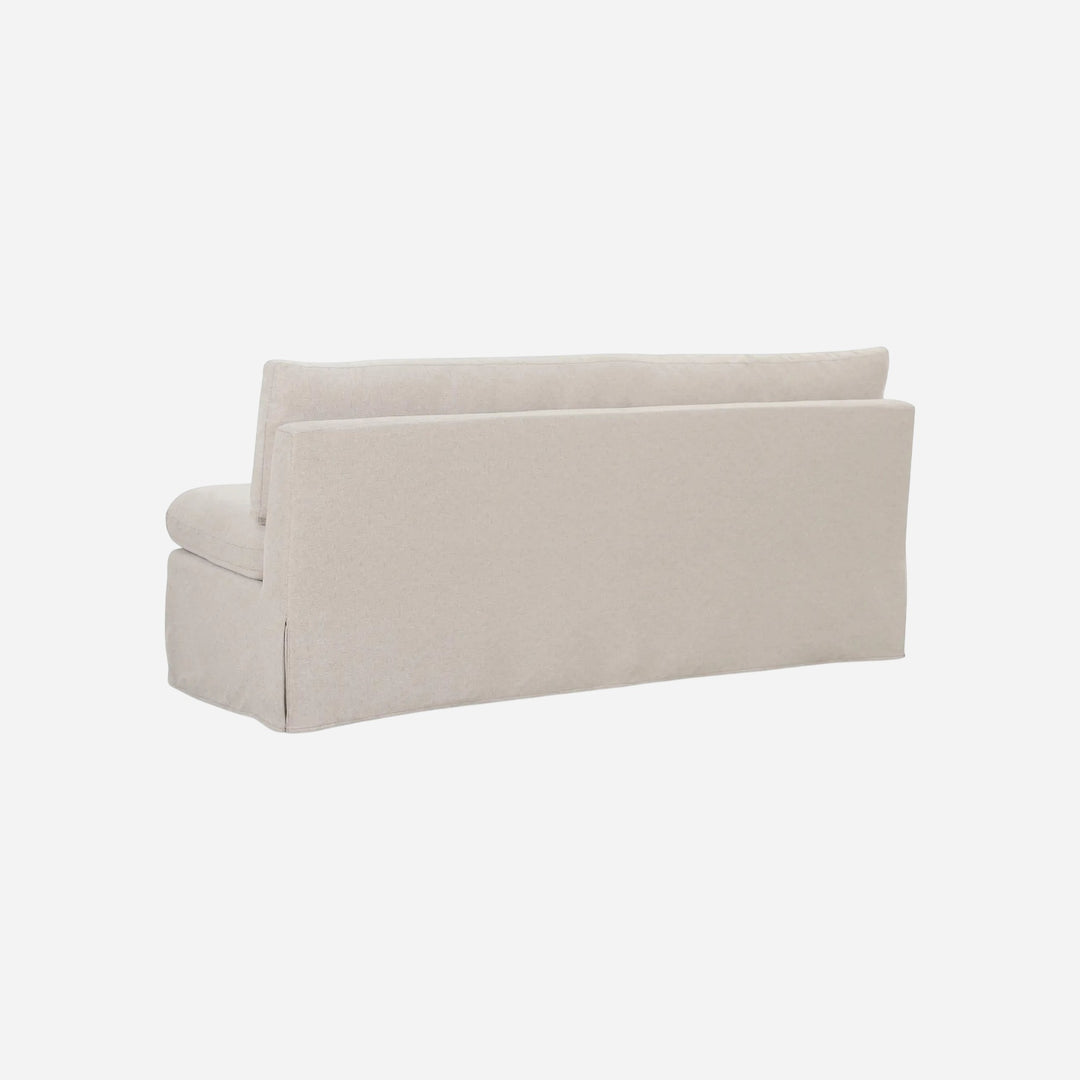 Banquette de salle à manger Maison Olive FABLE en tissu beige texturé avec jupe, vue arrière sur fond blanc.