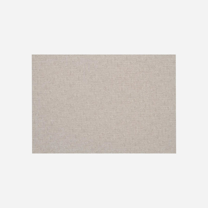 Gros plan sur le tissu texturé beige naturel de la banquette de salle à manger FABLE par Maison Olive