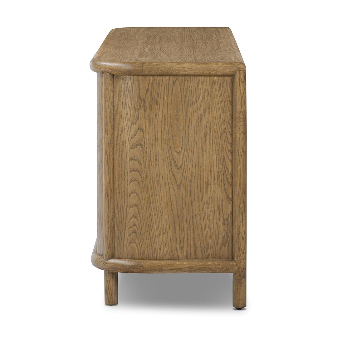 Buffet FLORENT en chêne clair de Maison Olive avec un cadre cylindrique et des lignes courbes.