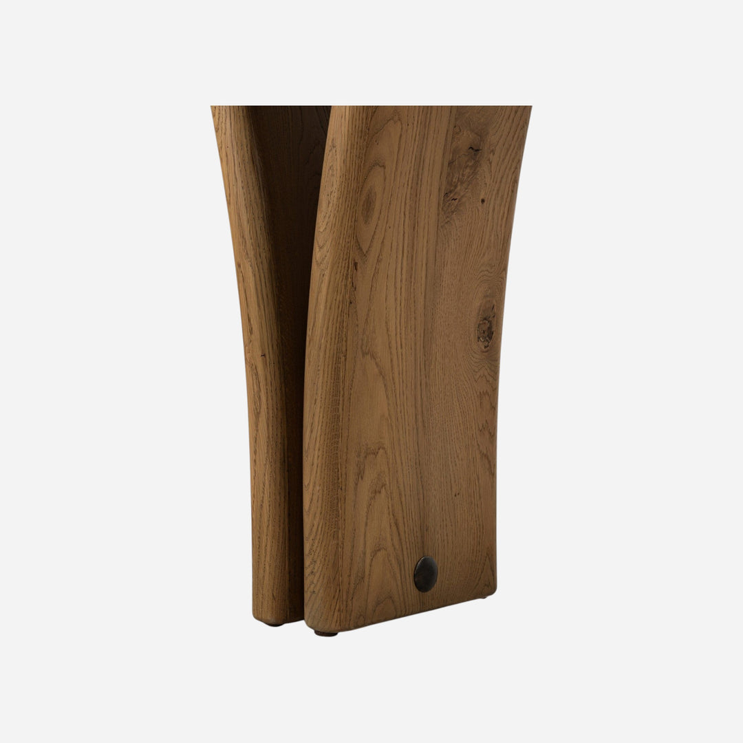 Console Maison Olive en bois de chêne sculpté, finition naturelle, pieds organiques uniques.