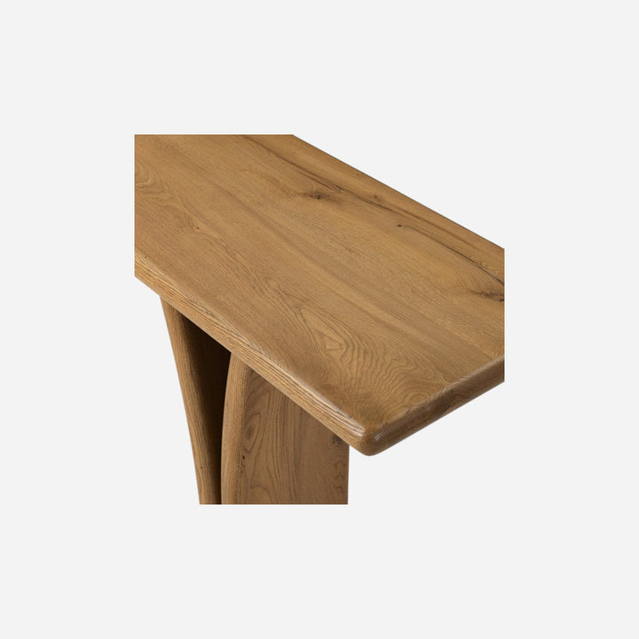 Console en bois de chêne naturel Maison Olive avec pieds sculpturaux organiques et finition mate.