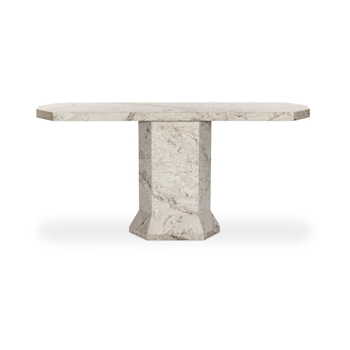 Console octogonale en marbre beige et blanc de Maison Olive, avec un piètement sculpté.