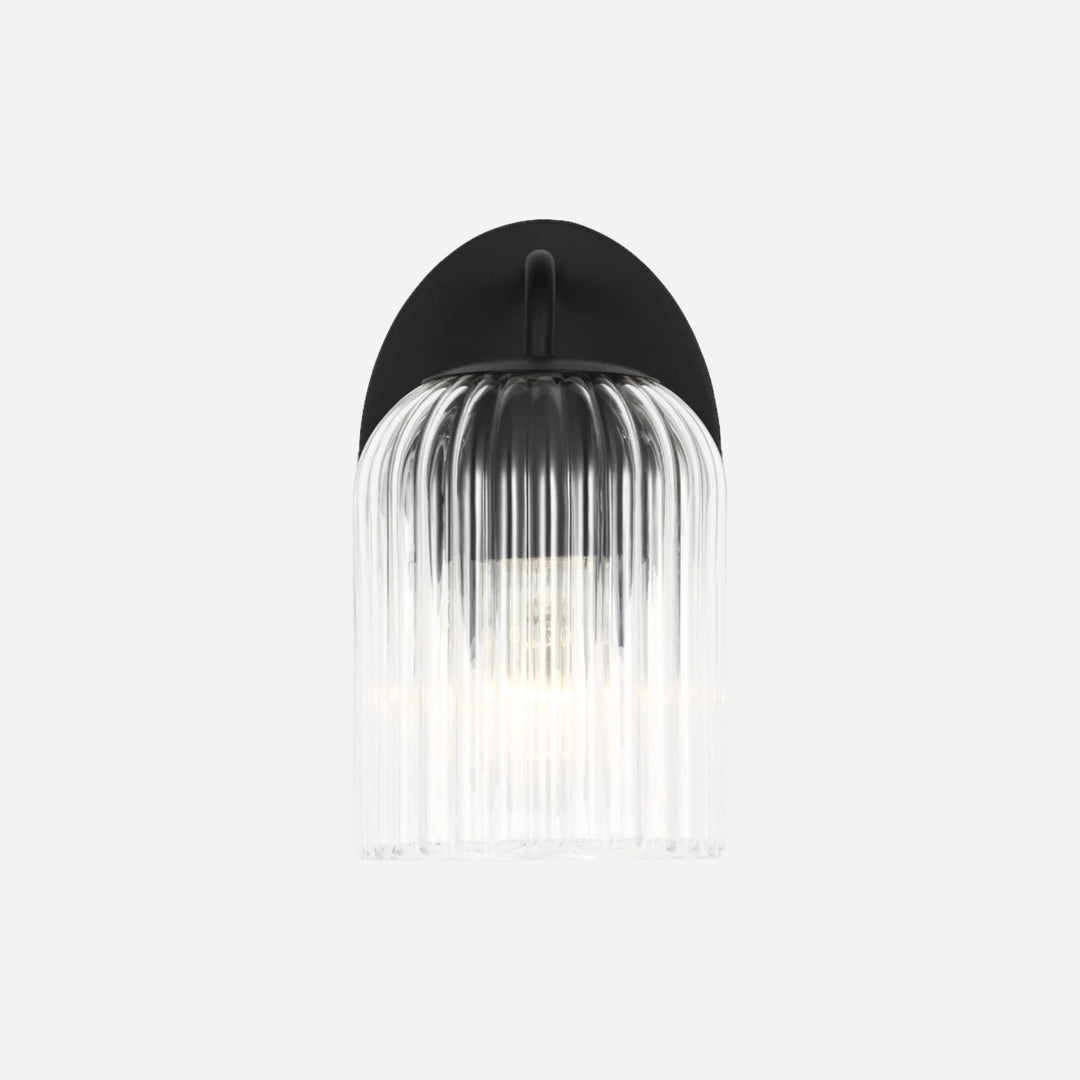 Applique murale Maison Olive EISELE avec base noire et abat-jour en verre cannelé transparent au design minimaliste