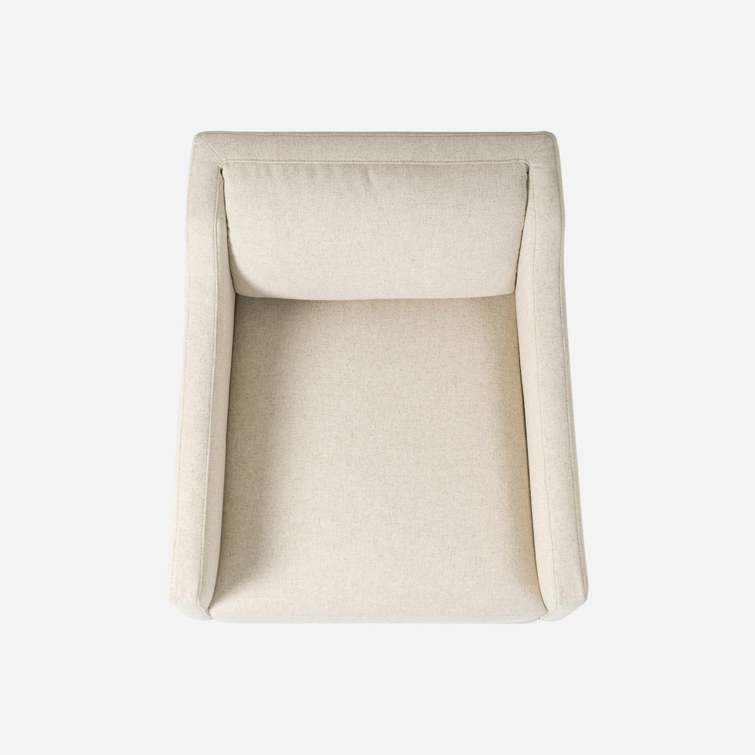 Fauteuil pivotant Maison Olive en tissu texturé beige, design moderne et confortable, idéal pour salon ou bureau.