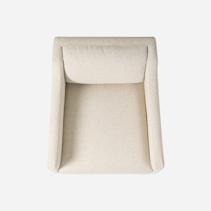 Fauteuil pivotant Maison Olive en tissu texturé beige, design moderne et confortable, idéal pour salon ou bureau.