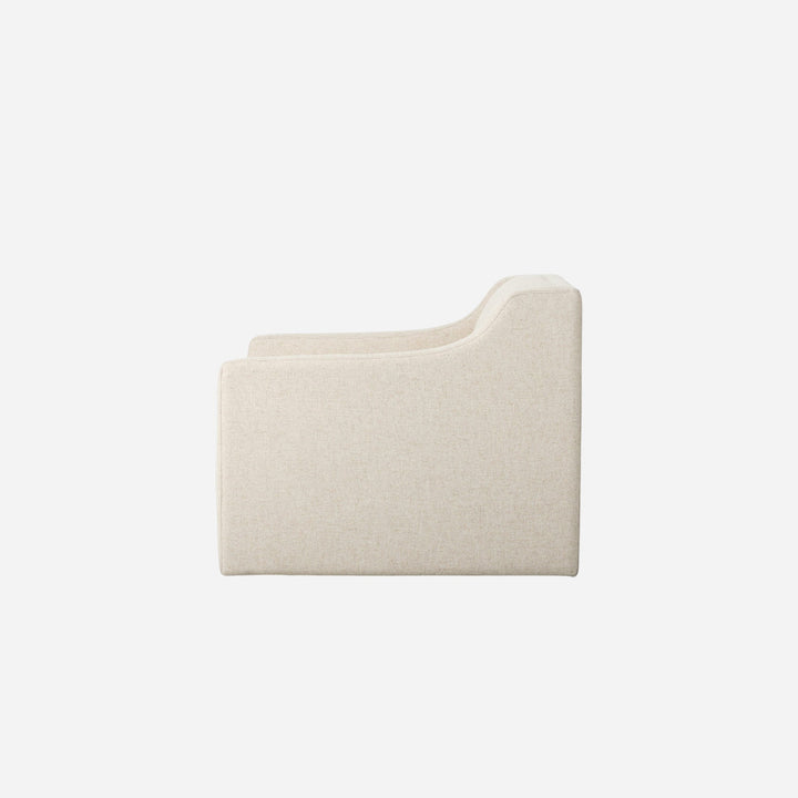 Fauteuil pivotant Maison Olive en tissu texturé beige, design moderne et épuré, idéal pour salon ou bureau.