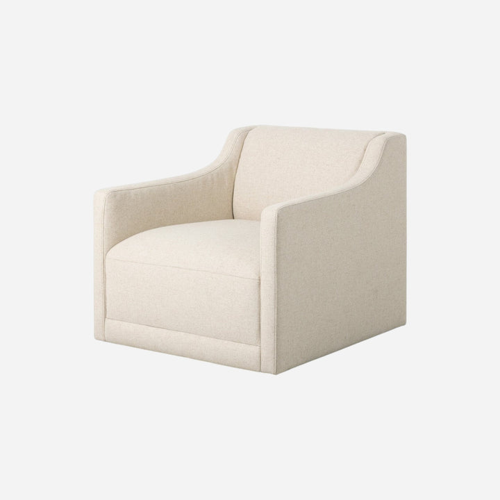 Fauteuil pivotant Maison Olive en tissu texturé beige, design moderne et confortable.