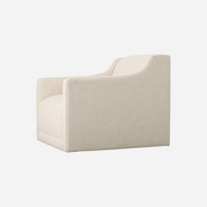 Fauteuil pivotant Maison Olive en tissu texturé beige, design moderne et confortable pour salon ou bureau.