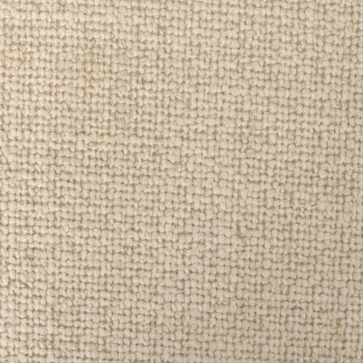 Maison Olive fauteuil en tissu crème texturé et structure en bois clair, design épuré et naturel.