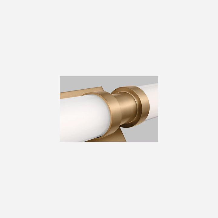 Applique murale Maison Olive Kiel en métal doré avec diffuseur cylindrique en verre givré au design minimaliste