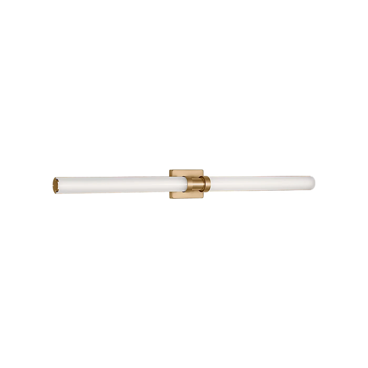 Applique murale Maison Olive Kiel au design minimaliste avec diffuseur cylindrique en verre givré et finition dorée