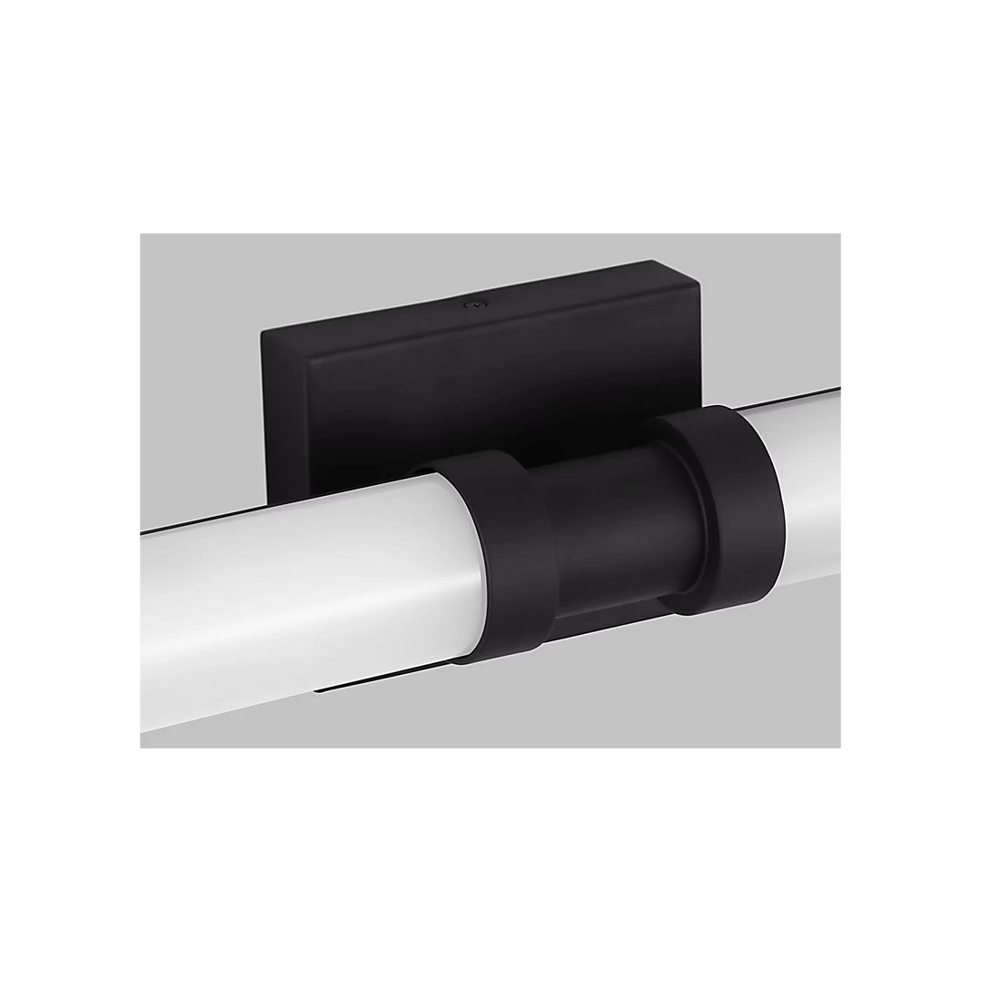 Applique murale Maison Olive Kiel avec diffuseur cylindrique en verre givré et support noir mat minimaliste