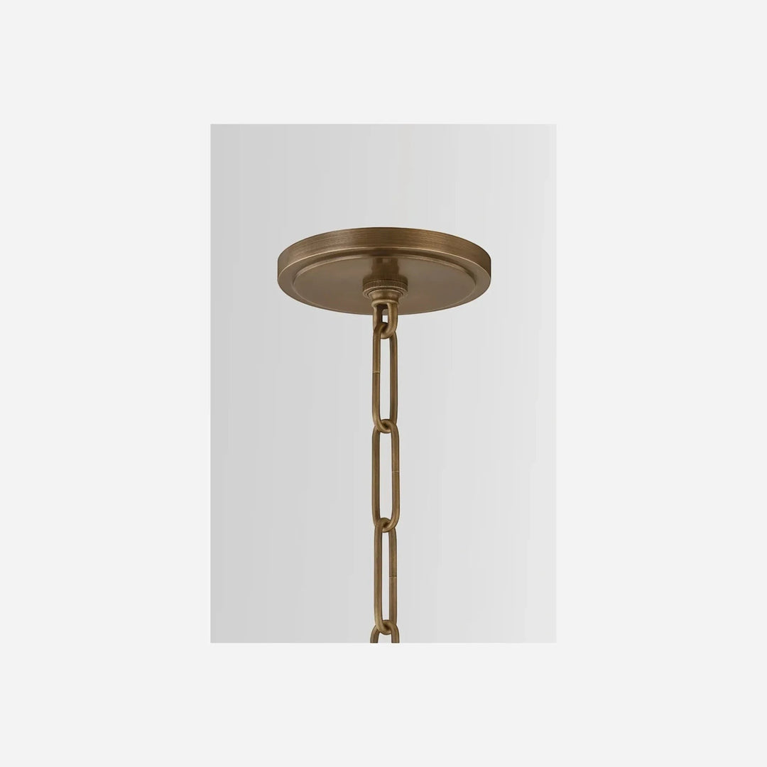 Maison Olive lustre suspendu en verre opalin et métal doré, abat-jour diffusant une lumière douce, chaîne réglable.