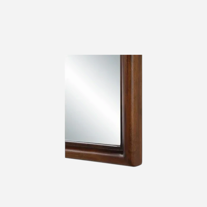Miroir arqué Maison Olive avec cadre en bois massif finition noyer, vue rapprochée des détails du cadre