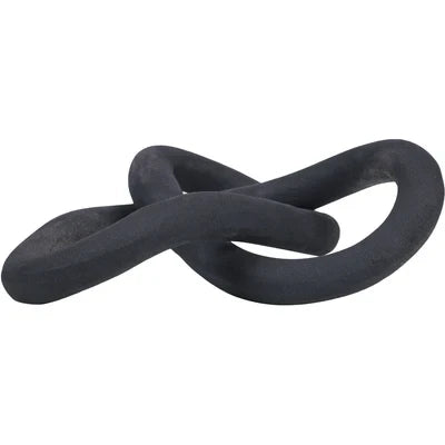 Objet décoratif Maison Olive en forme de nœud sculptural noir mat au design minimaliste et organique
