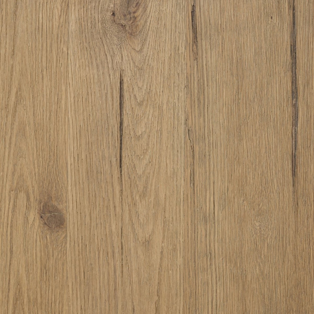 Maison Olive PADEN table d'appoint en chêne usé avec pieds en forme de croissant et plateau rond.