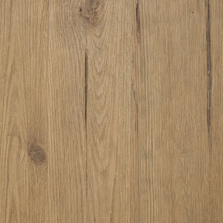 Maison Olive PADEN table d'appoint en chêne usé avec pieds en forme de croissant et plateau rond.