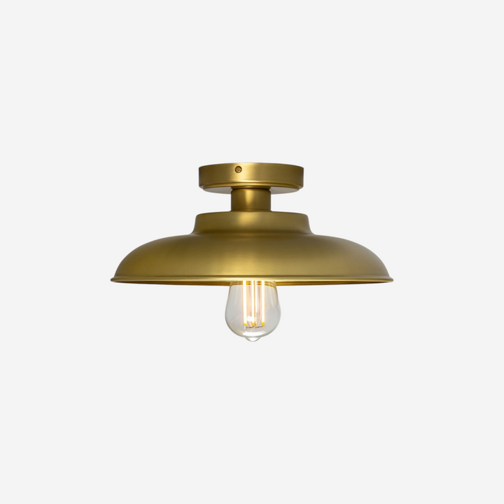 Plafonnier industriel Maison Olive en laiton brossé avec une ampoule Edison apparente