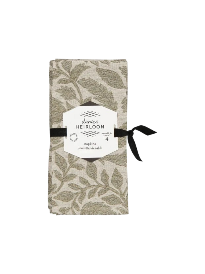 Ensemble de quatre serviettes de table Maison Olive en coton beige avec un motif végétal élégant et intemporel.