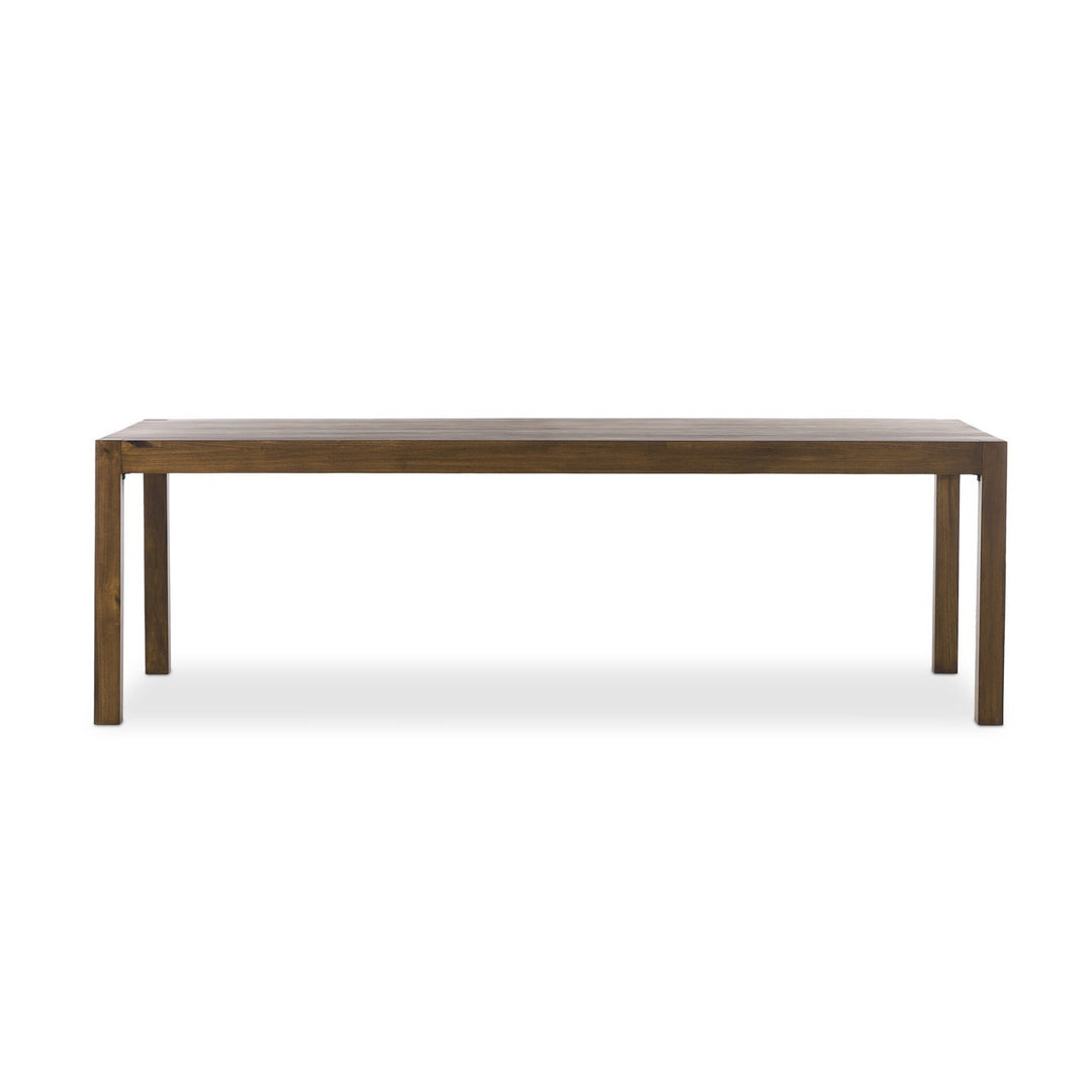 Maison Olive Table basse rectangulaire en bois massif, finition naturelle, design contemporain, pieds robustes.