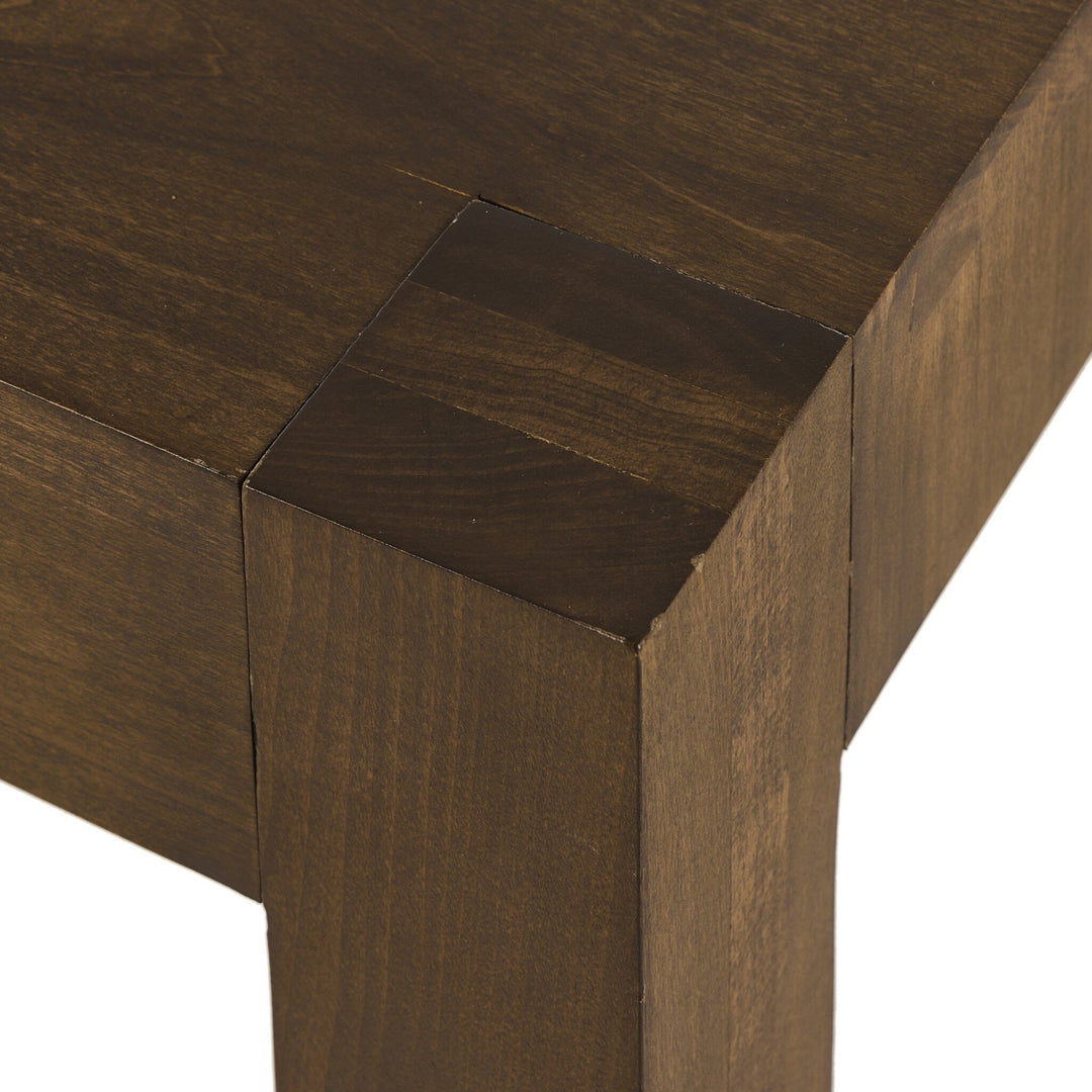 Maison Olive table basse contemporaine en bois massif, finition brun foncé, design épuré.