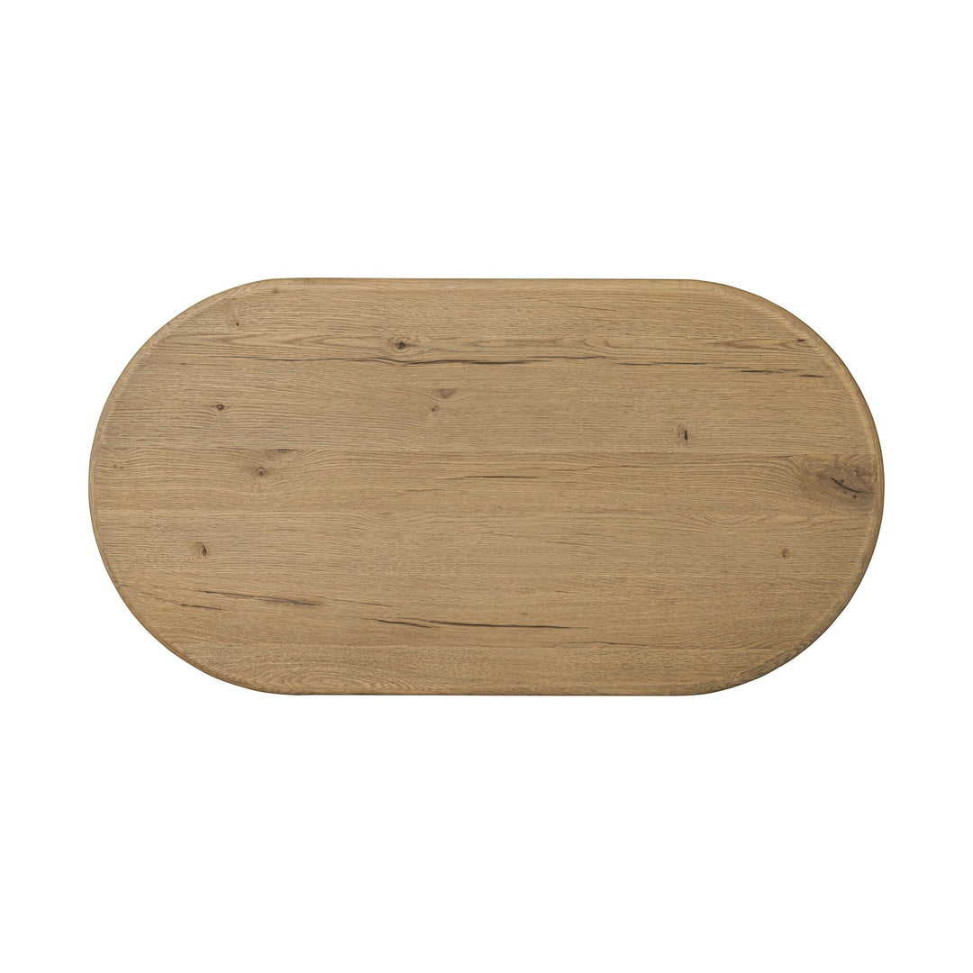 Maison Olive Table basse PADEN en chêne naturel clair, plateau ovale et pieds organiques.