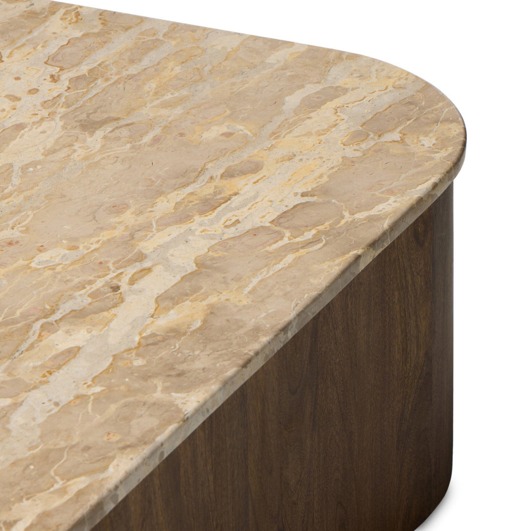 Table basse ronde Maison Olive en marbre beige veiné et bois foncé, design moderne et élégant.