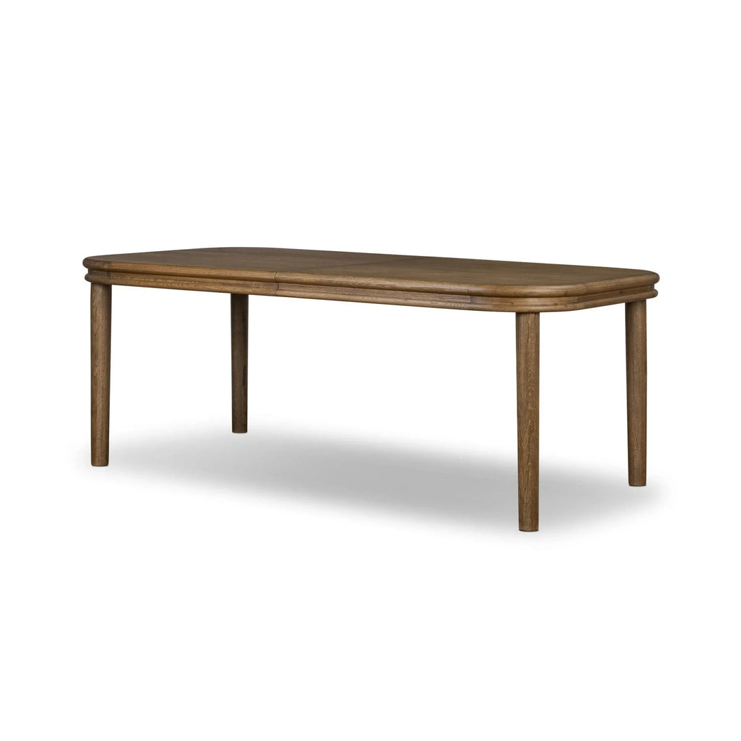 Table à manger Maison Olive en bois de chêne massif, plateau arrondi, finition naturelle, pieds solides.