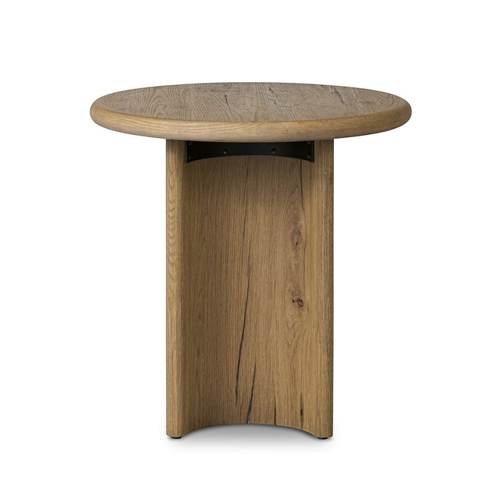 Maison Olive Table d'appoint PADEN en chêne patiné avec plateau rond et pieds incurvés, style organique.