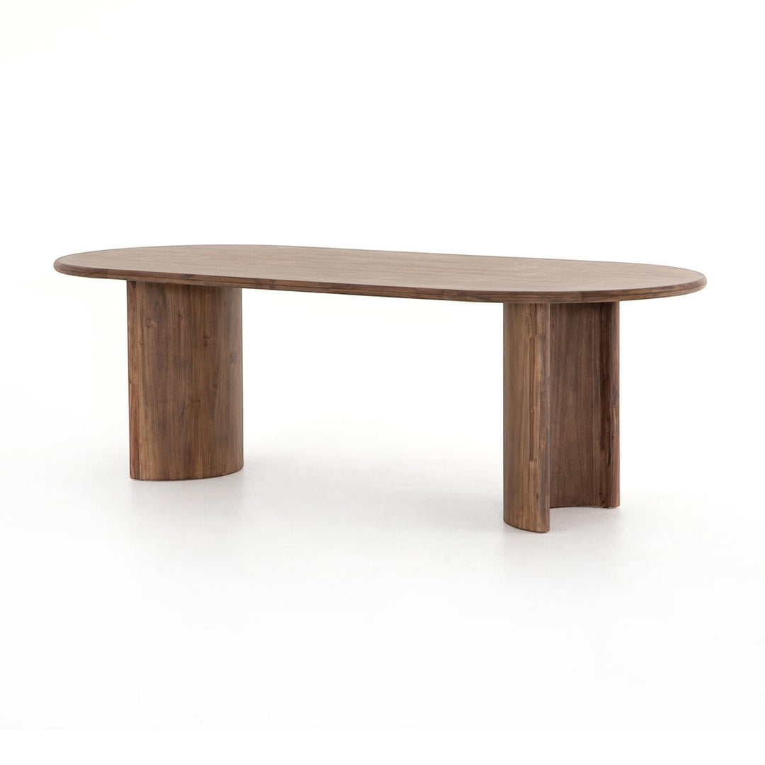 Table à manger ovale en bois d'acacia noir vieilli, design sculptural, piétement cylindrique, Maison Olive