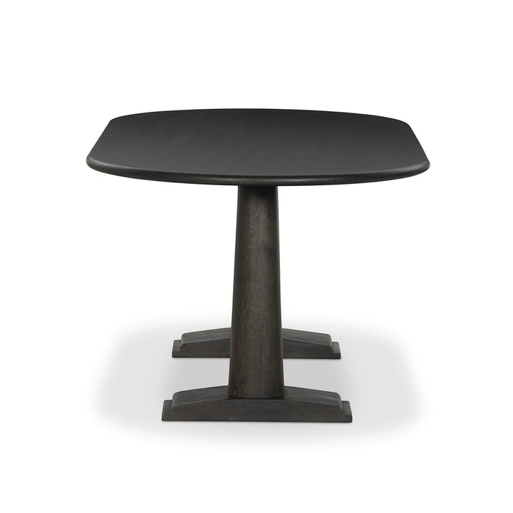 Table à manger ovale Maison Olive en bois foncé, piédestal central, design moderne.