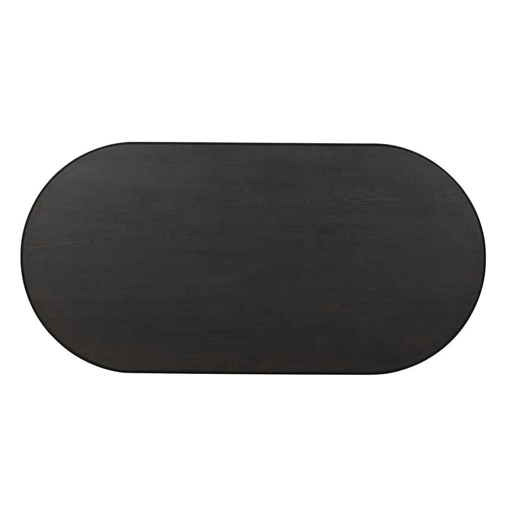 Table à manger ovale en bois de chêne noir Maison Olive avec grain subtil et piédestal central.
