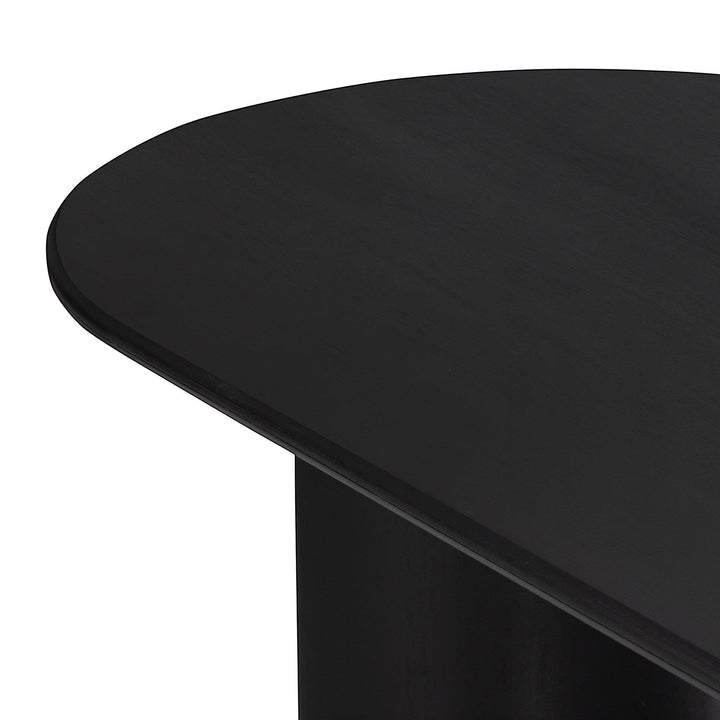 Table à manger ovale noire en bois massif Maison Olive avec piétement cylindrique
